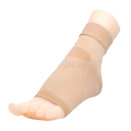 Image of foot wearing the Matrix Compression Foot Sleeve in Beige, showing discreet support for plantar fasciitis and Achilles tendonitis