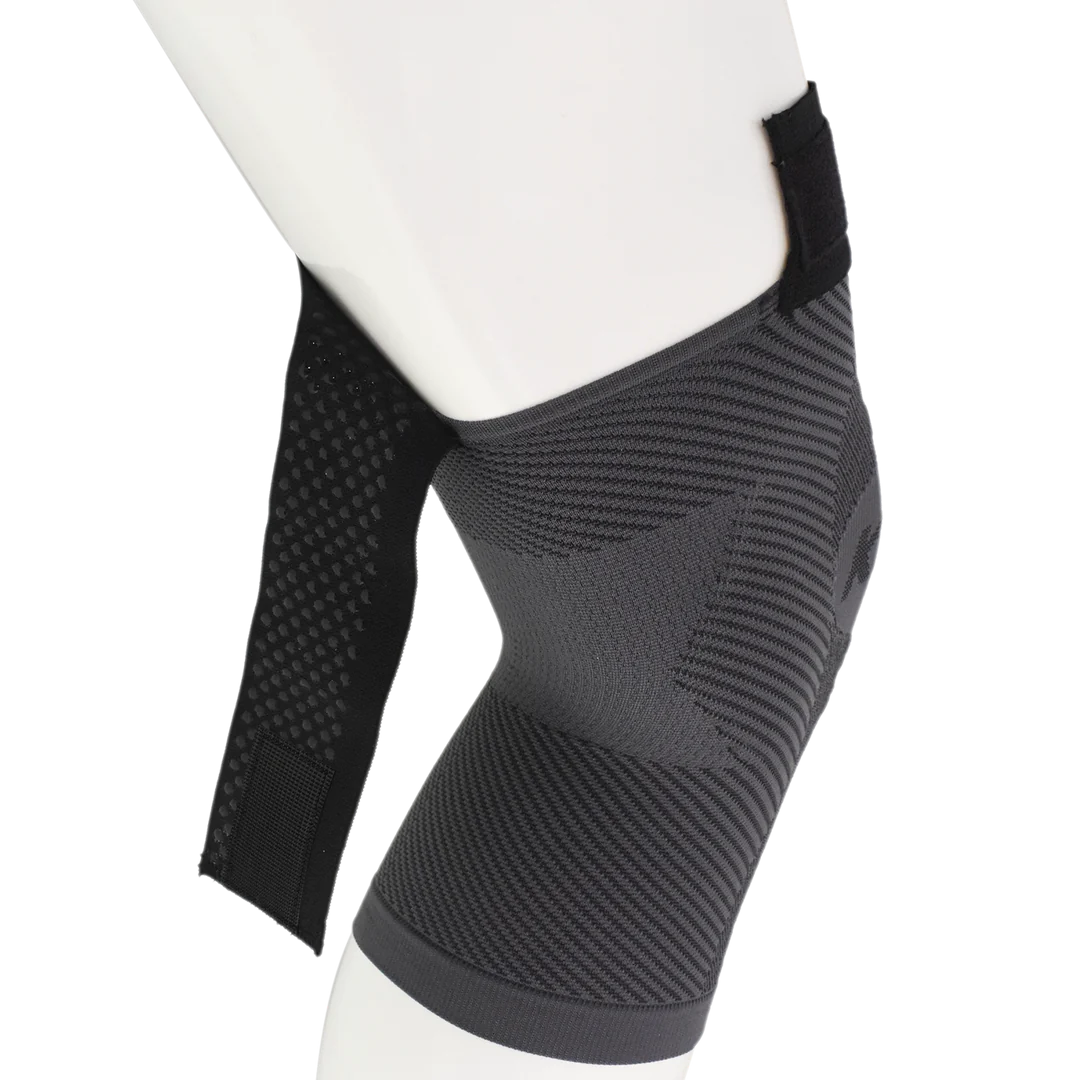 OS1st KS7+ Adjustable Performance Knee Sleeve in black, offering targeted compression for knee pain relief and support, designed to improve mobility during activity.