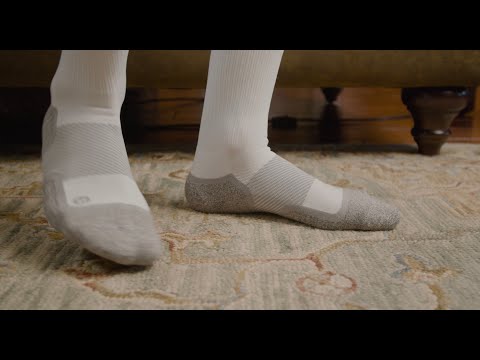 Video on how to wear OS1st WP4 Wellness Performance Crew Socks, offering targeted compression to improve circulation and provide comfort for everyday wear and foot recovery.