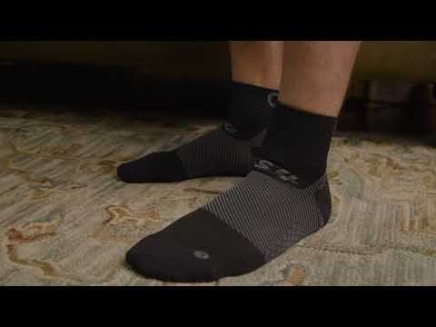 Video on how to wear OS1st FS4 Quarter Crew Socks designed for Plantar Fasciitis relief, providing targeted compression and support for the arch and heel of the foot.