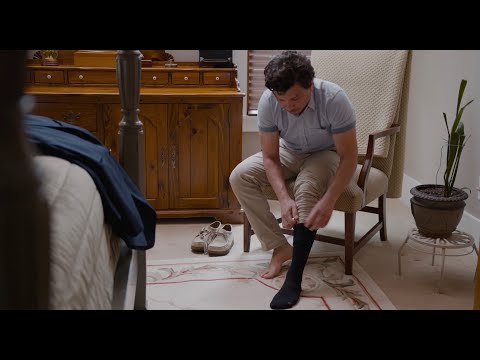 Video on  how to wear OS1st TS5 Travel Socks, providing compression support to improve circulation and reduce discomfort during travel and long periods of sitting.